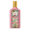 gucci flora gorgeous gardenia eau de perfume in a pink bottle with a gold cap