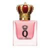 dolce & gabbana q eau de perfume in a pink bottle with a gold crown cap